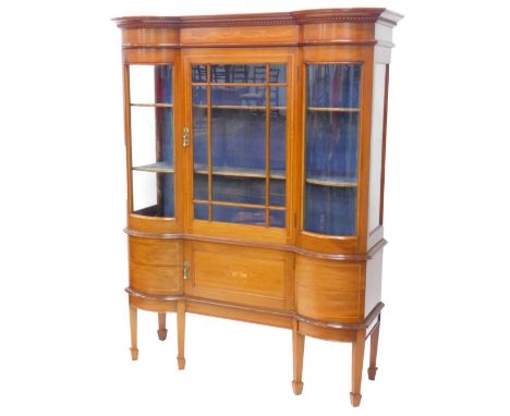 An Edwardian mahogany and marquetry display cabinet, of inverted breakfront form, with central chequer banded glazed door, fl