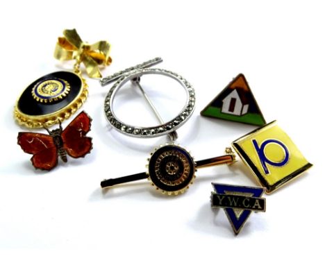 A quantity of modern costume jewellery, to include an enamel YMCA brooch, bow brooch, two in a wheel brooches, an enamel butt