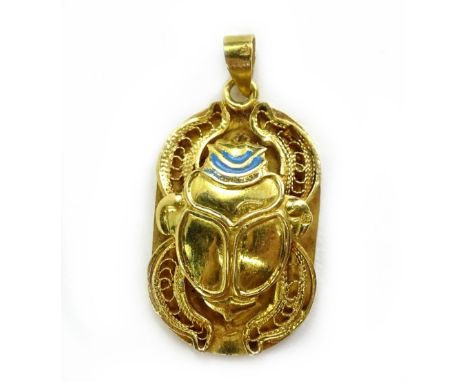 An Egyptian scarab pendant, the front with raised beetle, with blue enamel decoration. (AF), with similar symbols to the rear