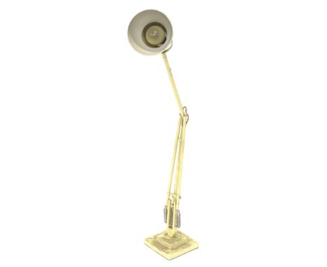 *An anglepoise cream enamelled table lamp, on square base, the base 14cm W.