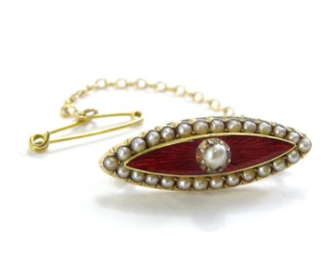 A Victorian bar brooch, set with central red enamel design, and decoration of central seed pearl, and bordered by seed pearls