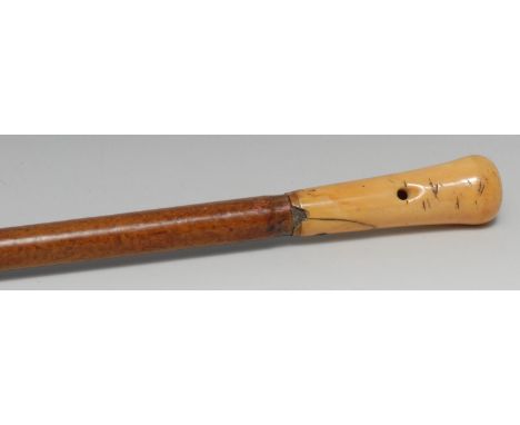 An early 18th century gentleman's ivory and malacca walking stick, of slender proportions, turned tapering handle, contempora