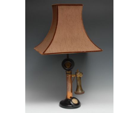 An early 20th century candlestick telephone, unusually converted to incorporate a table lamp, 61cm high overall 