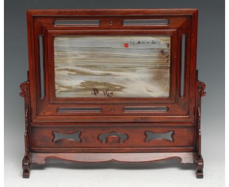 A Chinese hardwood and dreamstone scholar's table screen, red seal mark and inscribed with verse, the frame and stand pierced