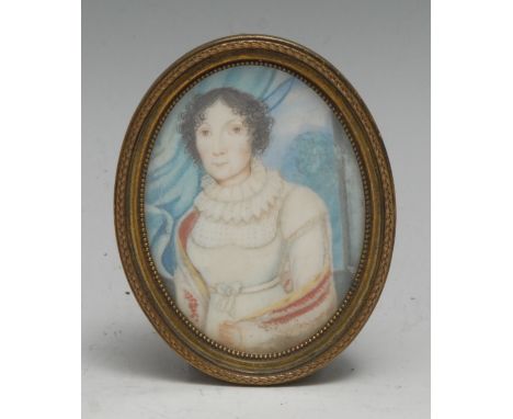 South European School (early 19th century), portrait miniature, of a lady, half-length, oval, watercolour on ivory, 6cm x 4.5