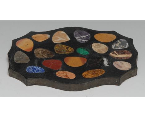 A pietra dura shaped serpentine desk weight, inlaid with pebble reserves of amethyst quartz, lapis lazuli, malachite and furt