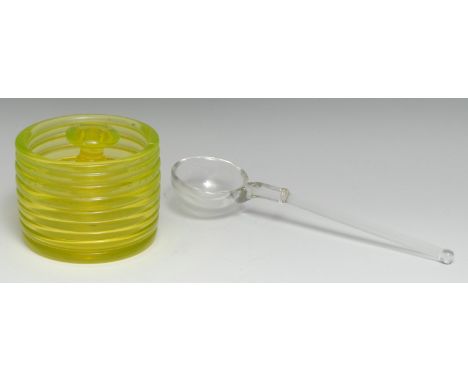 A 19th century uranium glass tobacco jar, weighted doubter, ground pontil, 12cm diam, c.1880; a glass ladle, 25.5cm long 