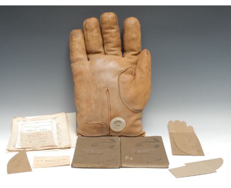 Advertising - an early 20th century promotional shop window display, as an oversize leather glove, the faux mother of pearl b