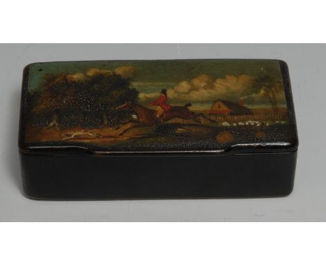 A 19th century papier mache rectangular snuff box, the hinged cover painted with a huntsman and hounds, 9cm wide, c.1860 