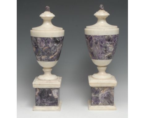 A pair of Neo-Classical design white marble and amethyst quartz mantel or table urns, square bases, 39cm high 