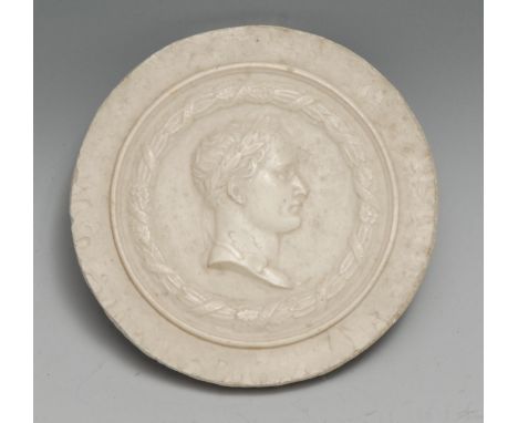 A 19th century sulphur cameo portrait roundel, of Napoleon Bonaparte as a Roman emperor, bust-length and in profile, crowned 