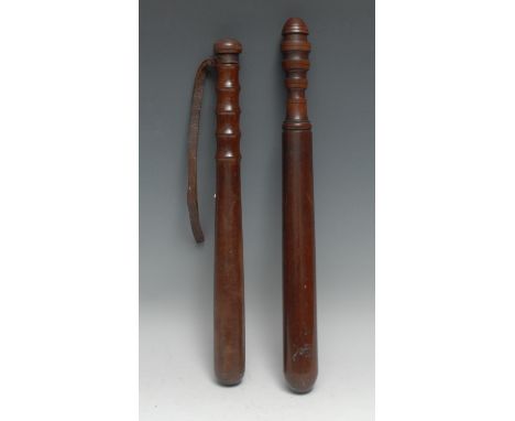 A 19th century mahogany truncheon, ring-turned handle, 41cm long, c.1880; another, rosewood (2) 