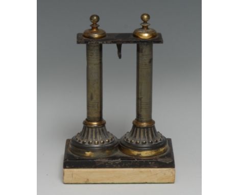 An architectural double-sided desk top pocket watch stand, as a pair of columns, rectangular marble base, 17cm high 