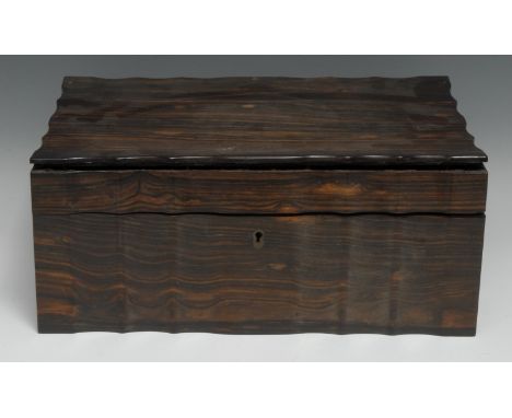 A 19th century Anglo-Indian/Ceylonese commode shaped work box, hinged cover enclosing a marquetry interior with two lift-out 