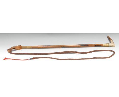 A Victorian gilt-metal mounted antler horn and bamboo riding whip, crop handle, chased foliate ferrule, 198cm long overall, c