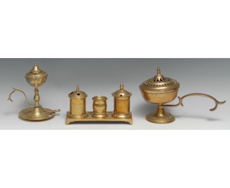A George III brass rectangular inkstand, comprising two wells centred by a pounce pot, bracket feet, 18cm wide, c. 1800; an u