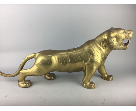 LARGE BRASS TIGER, 31cm high, modelled on all fours, along with a Chinese mother of pearl panel and a teddy bear (3)