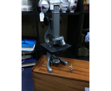 ENAMELLED MICROSCOPE BY BECK, in wood case, along with a vintage ophalmoscope in fitted case and other instruments