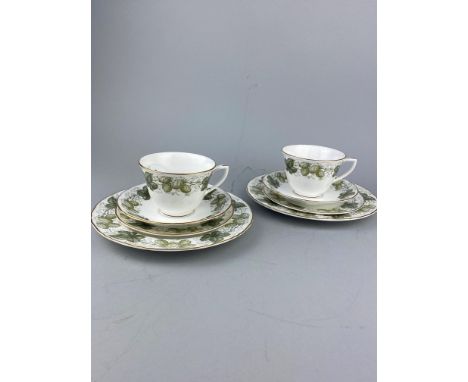 PART ROYAL WORCESTER TEA SERVICE, decorated in green with hops and leaves, including cups, saucers and side plates