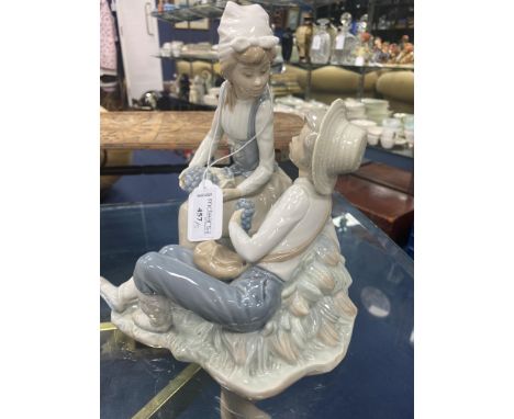 NAO FIGURE GROUP OF A COUPLE, modelled eating grapes, 24cm high, along with a ceramic animal figure, a Goebel model of a bird