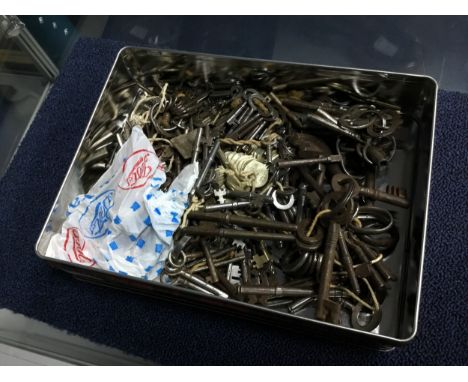 GROUP OF CLOCK KEYS, along with some 18th and 19th century dwelling keys and later examples