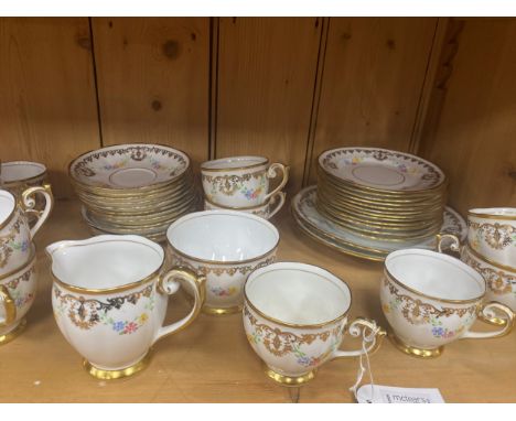 BELL CHINA FLORAL AND GILT PART TEA SERVICE, comprising eleven cups, twelve saucers, twelve side plates, cream, sugar and two