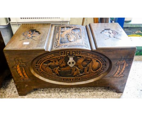 Camphor Wood Storage Trunk, delicately carved scenes of Asian life and other details. Curved top.W94cm