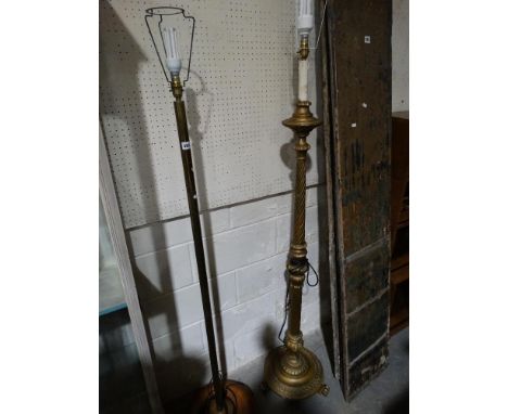     A Brass Column Standard Lamp, Together With A Turned Wooden Column Standard Lamp