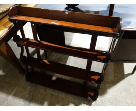     An Antique Mahogany Four Shelf Wall Rack                                        