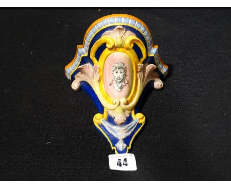 A Faience Ware Wall Bracket With Portrait Panel