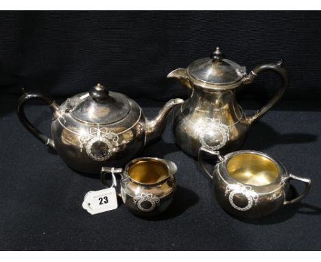     A Four Piece Britannia Metal Tea Service                                        