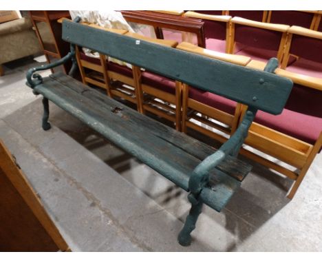     An Antique Wooden Seated Garden Bench On Cast Iron Branch Effect Ends           