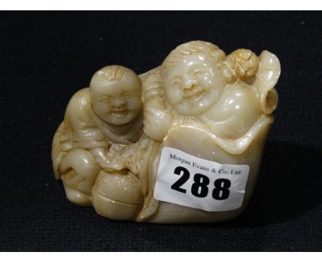     A Possibly Jade Carved Figural Group                                            