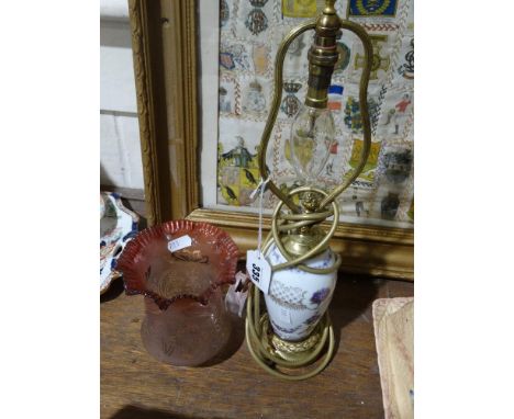     A Gilt Metal &amp; Ceramic Table Lamp Base Together With A Cranberry Tinted Shade   