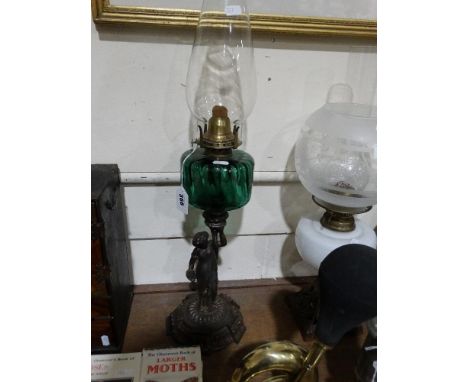     A Metallic Base Oil Lamp With Figure Column &amp; Green Glass Reservoir             