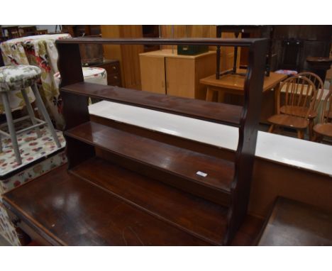 A Victorian mahogany open waterfall style shelf, width approx. 93cm