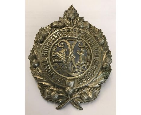 A 1st ARGYLL HIGHLAND RIFLE VOLUNTEERS CAP BADGE. The pierced centre with open mouthed boars head and cat with front paws rai