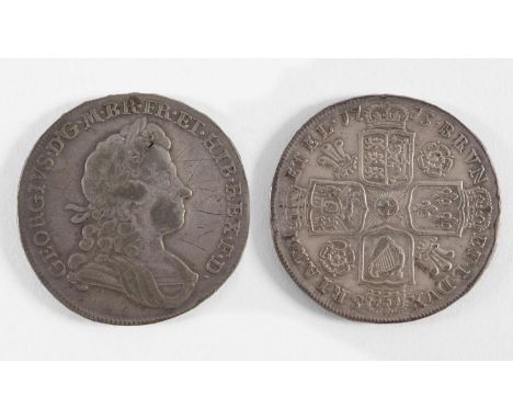 A GEORGE I HALFCROWN. A George I Halfcrown dated 1715, laureate and draped bust r, roses and plumes in angles, scratched init