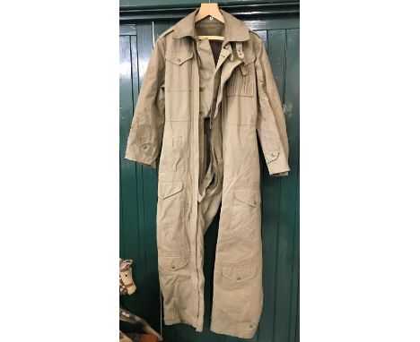 LIGHT KHAKI TANK OVERALLS. A set of lined light khaki Army tank overalls with numerous pockets and double zip front. Probably