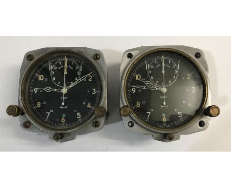 TWO SMITHS 8 DAY MILITARY AVIATION CLOCKS. Two V308 Smiths 8 Day cockpit clocks with trip timing function. Each with broad go