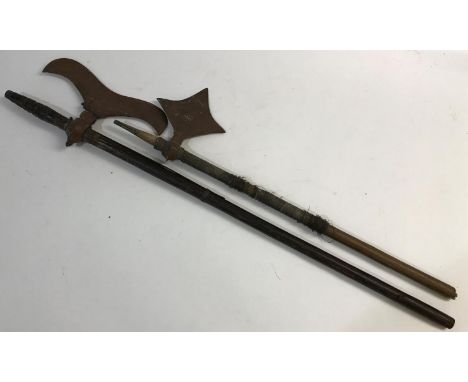 TWO DECORATIVE INDIAN AXES. An Indian axe with a serpentine blade with sharpened edge on a decoratively engraved and coloured