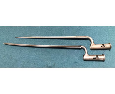 TWO BRITISH SPIKE/SOCKET BAYONET BY JOHN GILL. A British spike bayonet with a 42cm triform blade stamped John Gill and with W