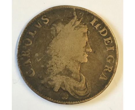 A CHARLES II CROWN. A Charles II Crown, dated 1662, first draped bust r, with rose below the bust, reverse with crowned cruci