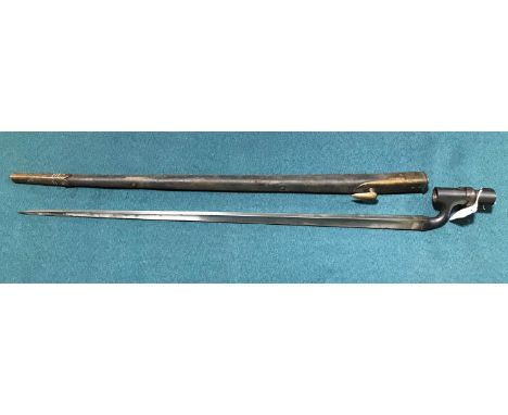 A VICTORIAN 1895 SOCKET BAYONET AND SCABBARD. An 1895 Pattern Martini Enfield bayonet with a 64cm triform blade with various 