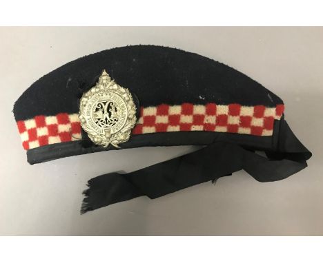 AN ARGYLL RIFLE VOLUNTEERS GLENGARRY CAP. A Scottish glengarry folding cap with 1st Argyll Highland Rifle Volunteers badge, w