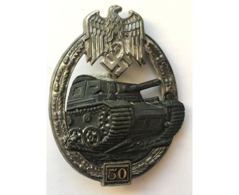 A SILVER TANK BADGE 50 CLASS. A Second World War or later German silver Tank Badge, 50 class with an army eagle and swastika 