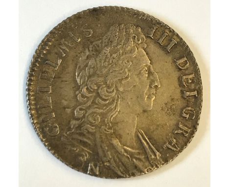 A WILLIAM III SHILLING. A William III Shilling dated 1697, first draped bust r, N below the bust for the Norwich mint, revers
