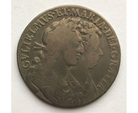 A WILLIAM AND MARY HALFCROWN. A William and Mary Halfcrown dated 1689, first busts r and first crowned shield, regnal year to