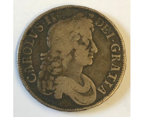 A CHARLES II CROWN. A Charles II Crown dated 1677, third draped bust, r, reverse with interlaced Cs to angles. Regnal year  V