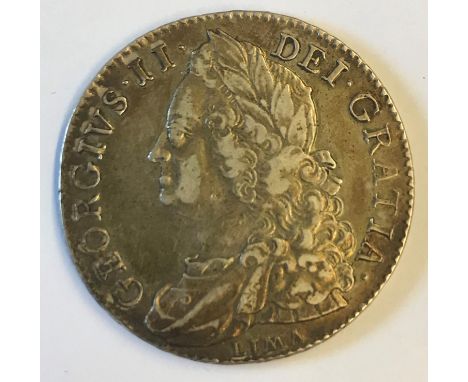 A GEORGE II HALFCROWN. A George II Halfcrown dated 1746, old laureate and draped bust l, reverse with plain angles and LIMA b